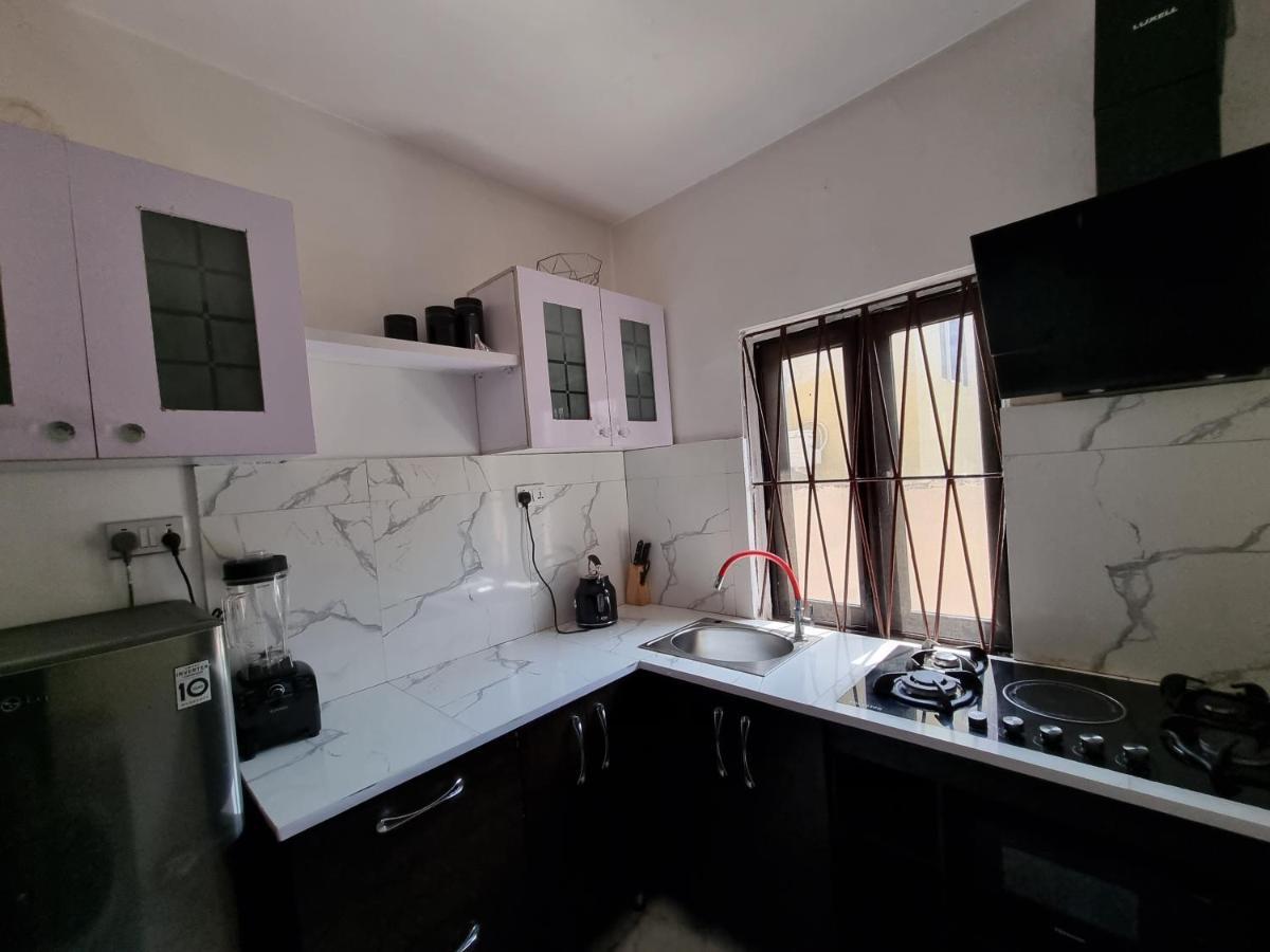 Cg Apartments Ikeja Exterior foto